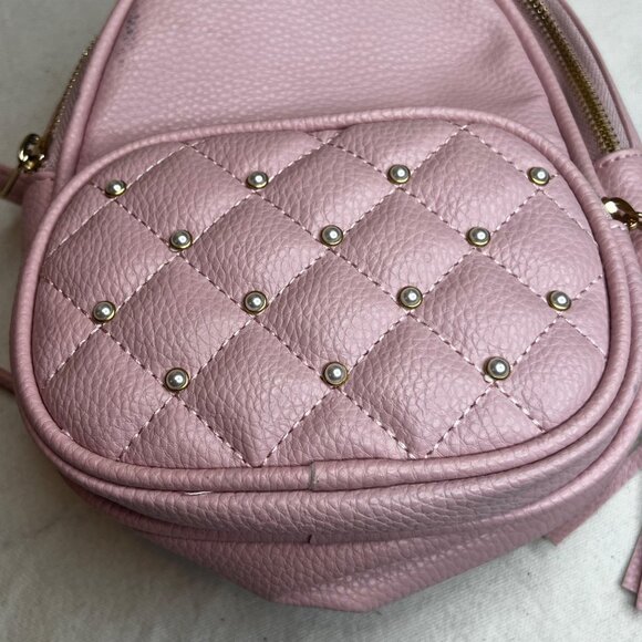Pink Quilted Mini Backpack With Tassel Accents & Adjustable Strap By Claires - Picture 13 of 16